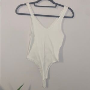 White Bodysuit with Deep V-Neck and Thin Straps